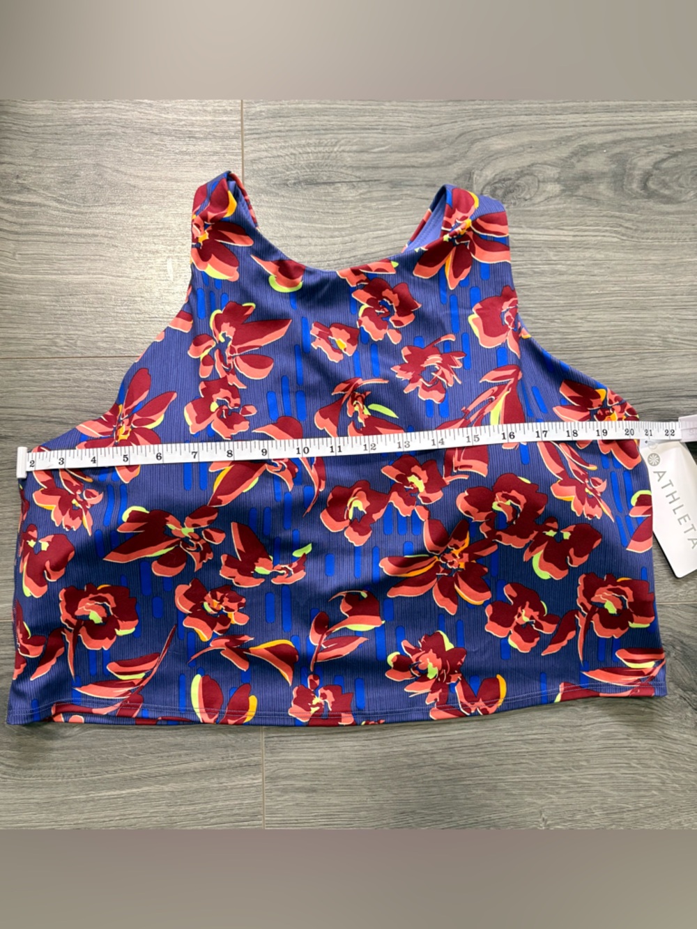 Athleta Red Floral Tank on Blue Background